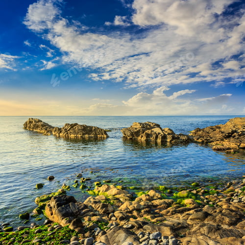Preview: Calm Sea Wave Wash The Boulders And Brings Seaweed