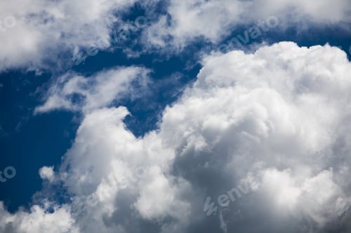Preview: Beautiful, Fluffy, White And Grey Clouds And Blue Sky
