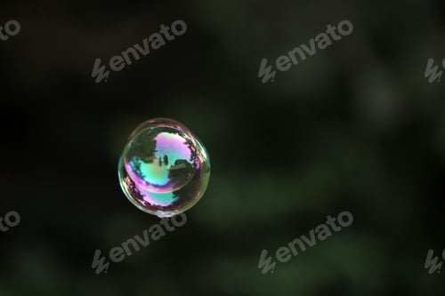 Preview: Joined Air Bubbles On A Sunny Summer Day Outdoors, With Dark Green Background