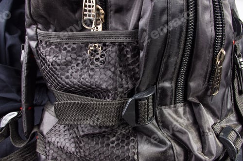 Preview: Closeup Of Buckles, Clasps, Zippers, Pockets, Fasteners, Fittings And Seams In The Black Backpack
