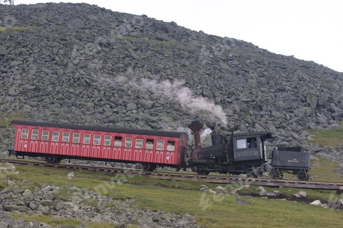 Preview: Mountain Landscape With Cog Railway Steam Train Slowly Driving Up The Mountain