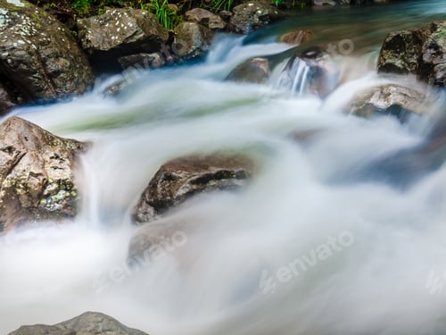 Preview: Fast Flowing Water Of A Mountain River With Motion Blur