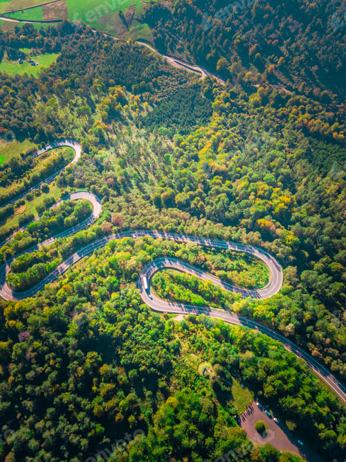 Preview: Serpentine Road In Bieszczady Mountains Photographed From Drone. Curves On Asphalt Road, Top Down
