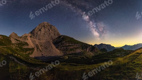 Preview: Milky Way Over The Mangart Saddle Below The Mangart Mountain. Beautiful Night Scene In Julian Alps
