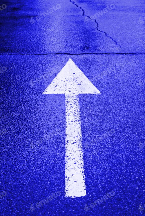 Preview: White Arrow On The Wet Asphalt, Detail Of An Arrow Of Direction, Traffic Signal