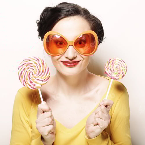 Preview: Funny Woman Wearing Big Bright Sunglasses Holding Lollipop