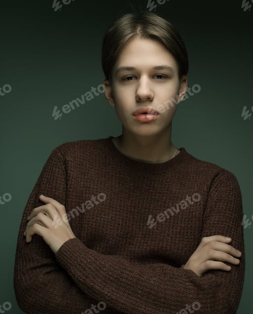 Preview: A Young Teenage Boy Being Photographed In A Studio.