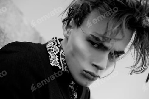 Preview: Portrait Of Sexy Handsome Fashion Nale Model Dressed In Elegant Suit Posing Outdooe. Long Haired