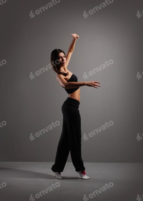 Preview: Young And Sexy Modern Dancer Over Grey Background