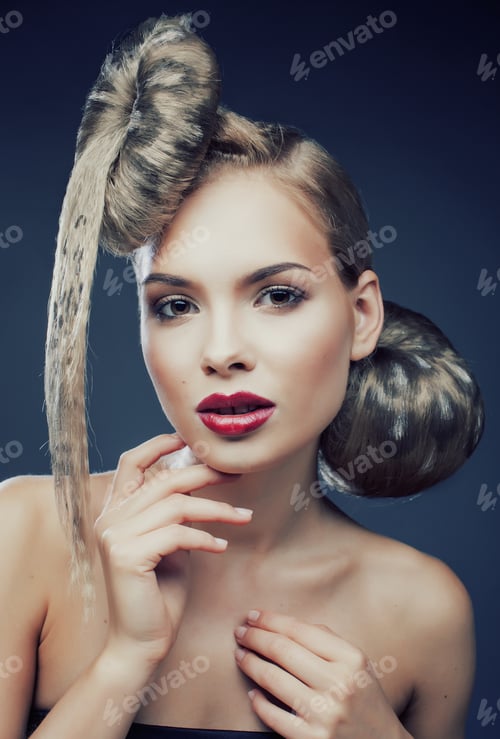 Preview: Young Elegant Woman With Creative Hair Style Leopard Print Close Up
