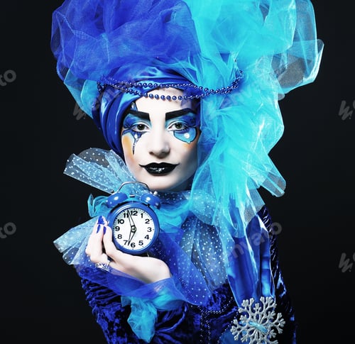 Preview: Beautiful Lady With Artistic Make-Up Holding Watch.