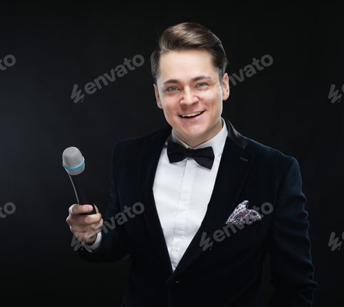 Preview: Young Handsome Man With Microphone
