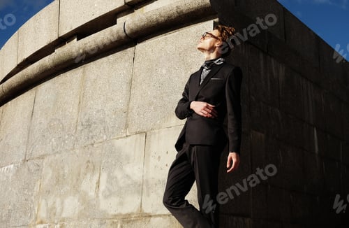 Preview: Handsome Fashionable Young Man In A Suit Posing Outdoor