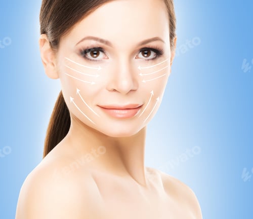 Preview: Spa Portrait Of Attractive, Young And Healthy Woman With Arrows On Her Face. Plastic Surgery