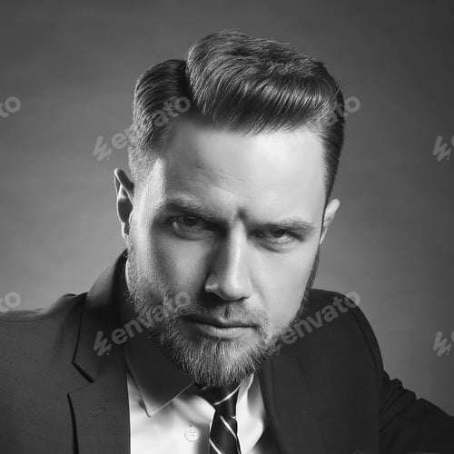 Preview: Young Handsome Bearded Caucasian Man With Blue Eyes Sitting On Chair. Perfect Skin And Hairstyle