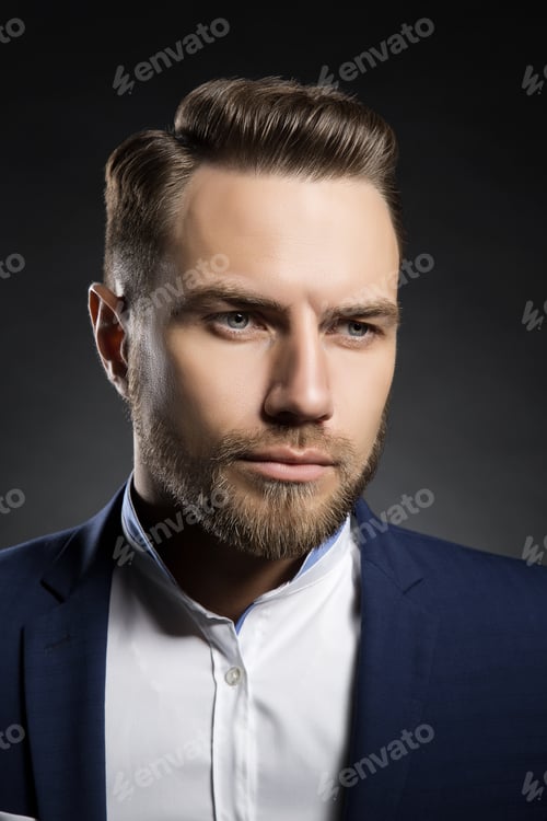 Preview: Portrait Of Handsome Stylish Caucasian Young Man In Elegant Blue Suit With Perfect Hair Style.