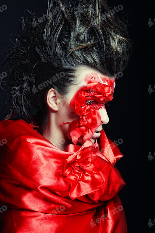 Preview: Young Woman With Creative Red Face Art