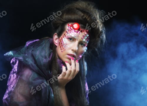 Preview: Portrait Of Woman With Artistic Make-Up In Blue Smoke