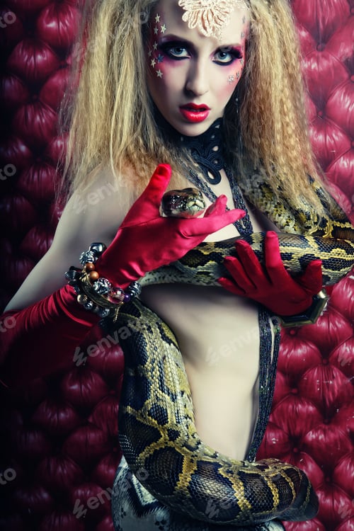 Preview: A Burlesque Woman Holding Phyton