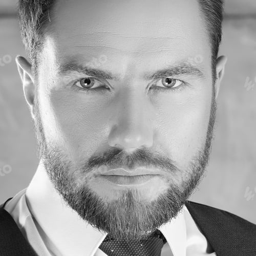 Preview: Portrait Of Handsome Stylish Bearded Young Man In Elegant Blue Suit With Vest And Perfect Hair