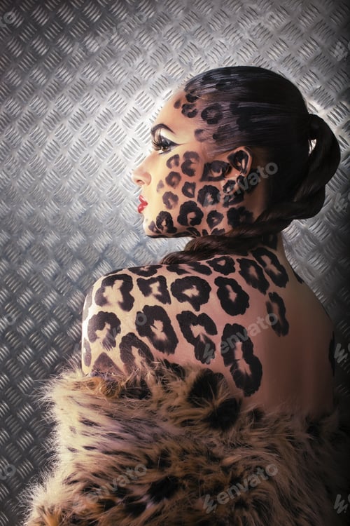 Vista previa: Close-Up Portrait Of Beautiful Young European Model In Cat Make-Up And Bodyart