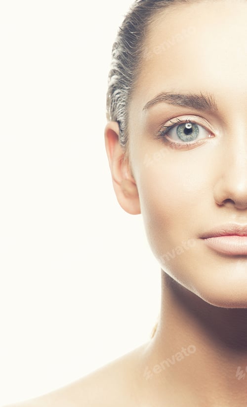 Preview: Beauty Face Of Caucasian Young Brunette Woman. Studio Portrait. Isolated On White Background. Toned.