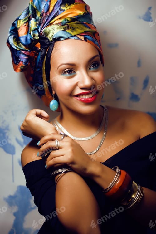 Preview: Beauty Bright African Woman With Creative Make Up, Shawl On Head Like Cubian Closeup Smiling