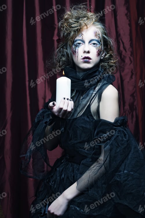 Preview: Young Woman With Creative Make Up. Halloween Theme.