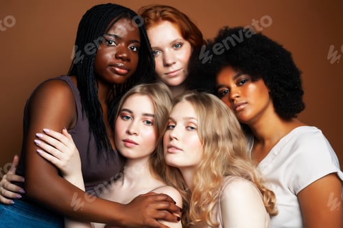 Preview: Young Pretty African And Caucasian Women Posing Cheerful Together On Brown Background, Lifestyle