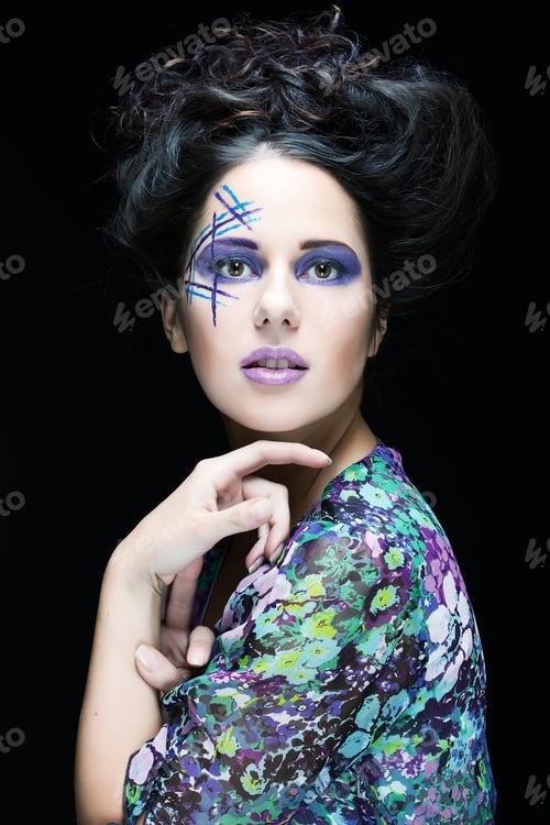 Preview: Beautiful Young Female Face With Bright Fashion Multicolored Make-Up