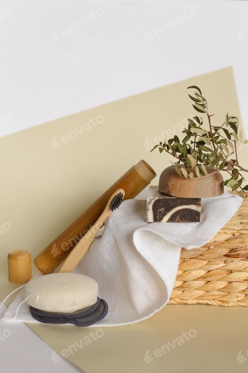 Preview: Natural Ecological Bamboo Toothbrush, Soap, Reusable Make Up Remover Pads And Sponge On White Towel