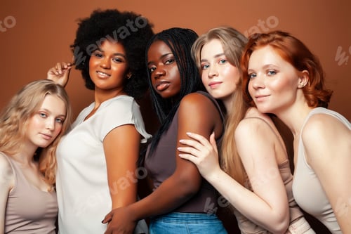 Preview: Young Pretty African And Caucasian Women Posing Cheerful Together On Brown Background, Lifestyle