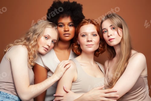 Preview: Young Pretty African And Caucasian Women Posing Cheerful Together On Brown Background, Lifestyle