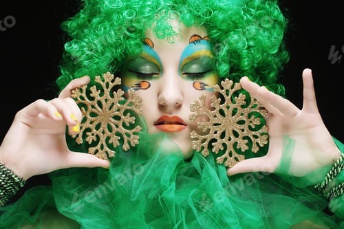 Preview: Beautiful Lady With Artistic Make-Up Holding Christmas Decorations.Doll Style.