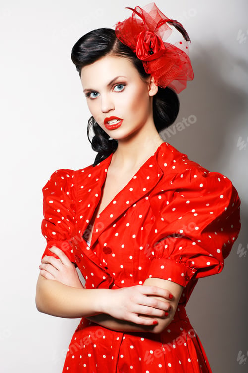 Preview: Elegant Strict Lady In Rd Retro Dress With Crossed Hands. Proud Brunette