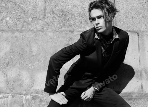 Preview: Portrait Of Sexy Handsome Fashion Nale Model Dressed In Elegant Suit Posing Outdooe. Long Haired