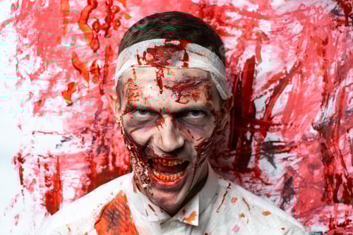 Preview: Crazy Zombie Horror Make Up. Person In White Shirt With Bloody Sweat. Scars, Deep Scratches