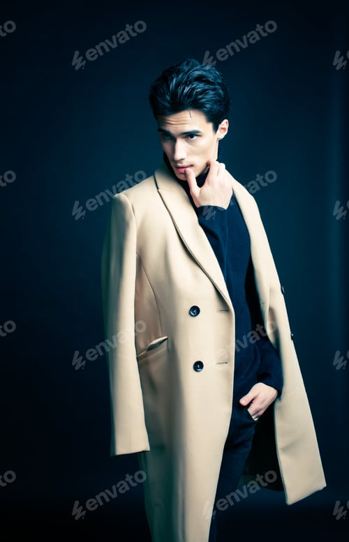Preview: Cool Real Young Man In Coat On Black Background Posing, Lifestyle People Concept