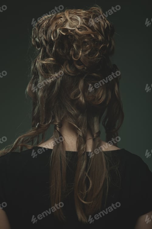 Preview: Woman With Elegant Hairstyle. Rear View.