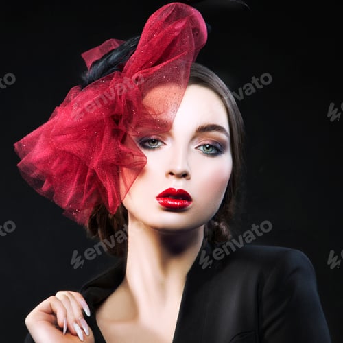 Vista previa: Fashion Art Portrait Of Beautiful Girl. Vogue Style Woman. Red Hat Hairstyle. Isolated On Black