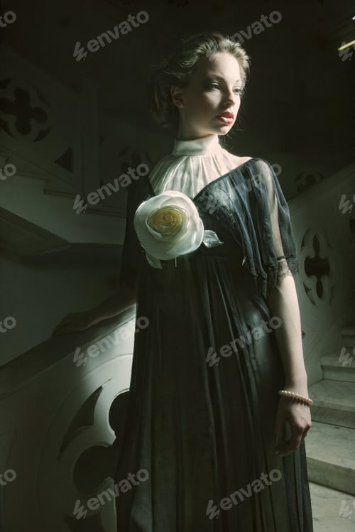 Preview: Woman In Elegant Dress Posing On Stairs