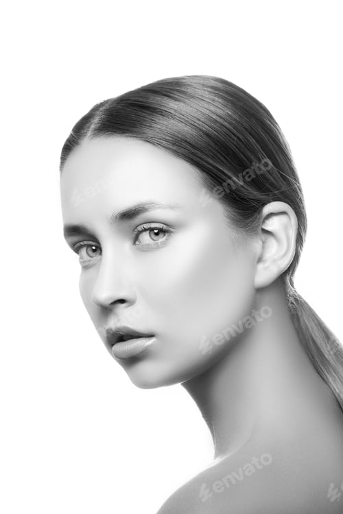 Preview: Beautiful Young Caucasian Girl With Natural Makeup Looking At Camera. Woman Portrait. Black And