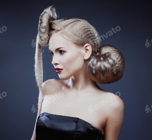 Preview: Young Elegant Woman With Creative Hair Style Leopard Print Close Up