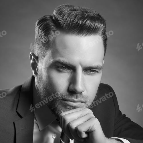 Preview: Young Handsome Bearded Caucasian Man With Blue Eyes Sitting On Chair. Perfect Skin And Hairstyle