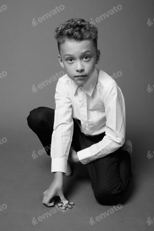 Preview: Young Boy As Businessman In Black And White