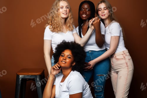 Preview: Young Pretty Caucasian, Afro, Scandinavian Woman Posing Cheerful Together On Brown Background