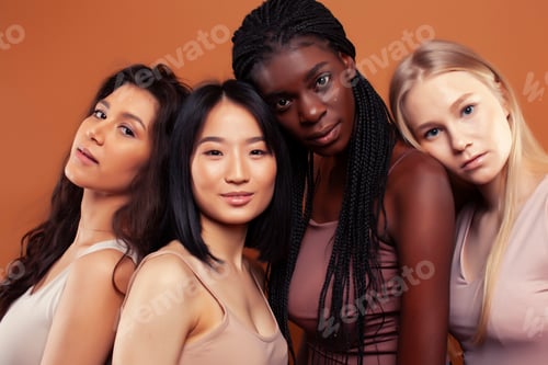 Preview: Young Pretty Asian, Caucasian, Afro Woman Posing Cheerful Together On Brown Background, Lifestyle