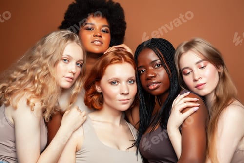 Preview: Young Pretty African And Caucasian Women Posing Cheerful Together On Brown Background, Lifestyle
