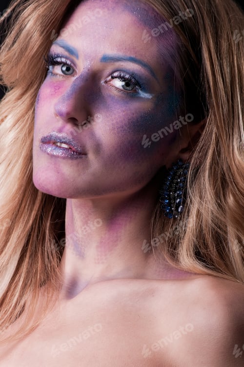 Preview: Portrait Of Attractive Woman With Creative Make Up Posing On Black Background