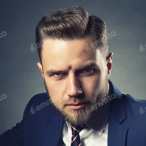 Preview: Young Handsome Bearded Caucasian Man With Blue Eyes Sitting On Chair. Perfect Skin And Hairstyle